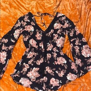 Short Romper with pink flower details